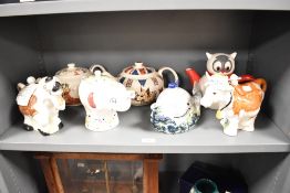 A quantity of tea pots, to include elephant, horse and whale