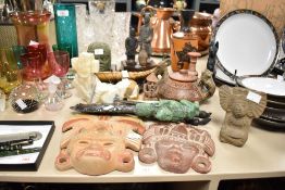 An Egyptian cat figure, h17cm, sold together with two Aztec style face plaques, two vases and two