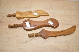 A set of 3 wooden knitting sheaths/sticks, largest L28cm