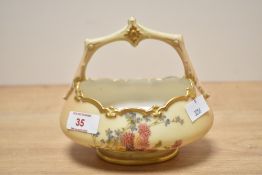 A Royal Worcester porcelain basket vase decorated with floral pattern, Rd No '304841' to reverse,
