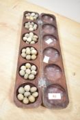 A Mankala games board, L42cm