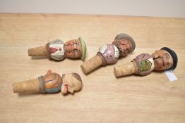 4 hand carved mechanical bottle stoppers, L11.5cm