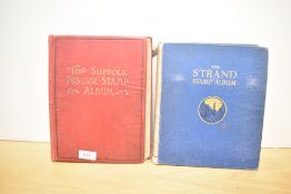 A strand stamp album containing various Egyptian, French and Greek stamps, sold together with a