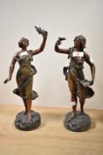 A pair of metal classical sculptures of female figures, h34cm