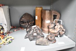 A 19th Century tooled leather jug, height approx 16cm and selection of resin and treen items