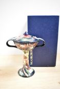 A Moorcroft pottery Symphony pattern Bonbonniere vase with cover, having twin handles and signed