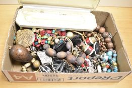 A large collection of costume jewellery, including wooden jewellery, statement pieces and beaded