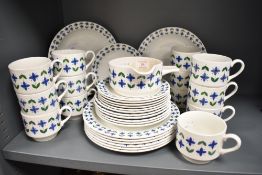 A Mid winter 'Roselle' tea service decorated with geometrical floral patterns, to include cups,