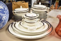 A selection of vintage Meakin table ware in the Bleu De Roi pattern including chargers, tureens