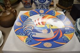 A large Poole pottery charger having painted marks to reverse for 'S.M. Pottinge R', limited edition