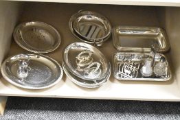 A selection of vintage silver plated items , including tureens, toast rack and glass condiment set