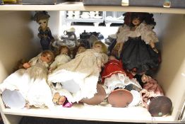 A large collection of vintage and later collectors dolls