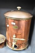 An antique copper tea or hot water urn , bearing brass plaque for Holgate & Fishwick, Liverpool,