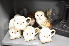 A selection of decorative ornaments, mainly owl themed including Beswick (model 1046), Fitz &