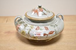 A Doulton Lambeth tureen with cover, decorated with floral designs, impressed and painted mark to