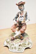 A 20th century ceramic figure of a gentleman smoking a pipe, signed Lucia to base, h28cm