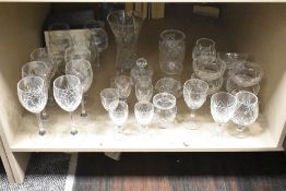A selection of cut glass to include wine and whisky glasses etc.