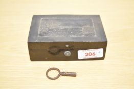 A small musical box with key, the box front decorated with landscape scene, L11cm