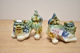 A pair of early 20th century Chinese Fu dog/lions, h9.5cm Condition report: Damaged