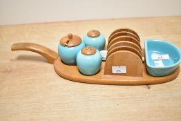 A 20th century cruet set, to include salt and pepper, spoon and tray, stamped to reverse 'Made in