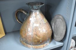A 19th copper 2 Gallon vessel having shaped spout and handle, h34cm, sold together with a pewter