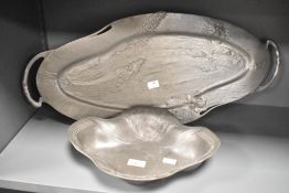 A pewter fish platter in the Art Nouveau style, decorated with fish, foliage and crabs, L62cm,
