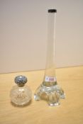 An Edwardian silver capped glass vase, of fluted form with pierced moulded feet, 27cm, along with an
