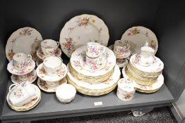 A Royal Crown Derby fine bone china dinner service having gilt edge and floral patterns, RD No '
