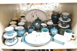 A Denby part dinner service, to include tea pot, cream jug and saucers ect