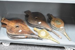 A group of four bellows, various sizes and designs including a brass mounted example with the Manx