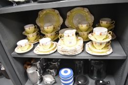 An attractive Heathcote China teaset, of Art Deco influenced design with twelve cups and saucers,