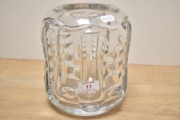 A clear cylindrical glass vase in the style of Asta Stromberg for Strombergshyttan, Sweden, having