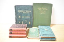 A News Chronicle Song Book 'Community Songs' sold along with three Thackery volumes, In the Woods by
