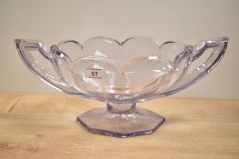 A clear glass bowl in the Art deco style having shaped handles, h15cm