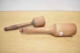 A primitive wooden pestle, L30.5cm, sold together with 1 other