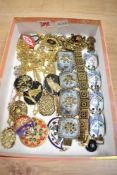 A collection of costume jewellery, including an enamel bracelet, statement necklaces and various