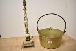 A 19th century brass jam pan having iron handle, w28cm, sold together with a vintage lamp A/F