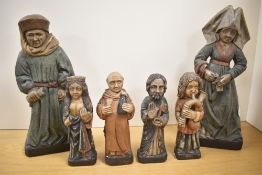 A group of Folk Art style figures, to include Dom Perignom, bagpipe player and Madonna ect (6)