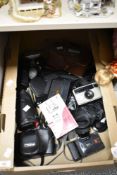 A quantity of cameras, to include a Kodak instamatic 28 and a Ricoh YF-20 camera ect