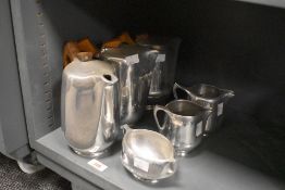 Six pieces of vintage Picquot ware, three tea pots, sugar and two creams