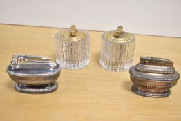 A pair of Ronson Varaflame gas lighters in the Art Deco style, L9cm, sold together with a pair of