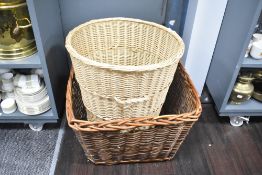 A woven wicker log basket and laundry basket