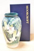 A Moorcroft pottery Collectors Club baluster vase, decorated in Angels Trumpets design, signed by