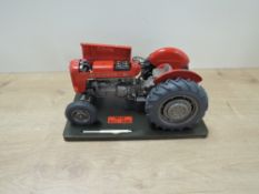 Universal Hobbies style 1:16 scale die-cast, MF 65 MK I Tractor No 023, on plinth, with unrelated