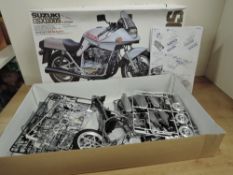 Tamiya 1:6 scale model kit, 16025 Suzuki GSX 1100S, opened and part made