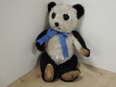 1950's Panda Mohair Teddy Bear, stitched nose and mouth, amber and black glass eyes, straw filled,