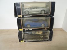 Three Maisto Special Edition 1:18 scale die-casts, 1992 Bugatti EB110, 1955 Mercedes Benz 300S and