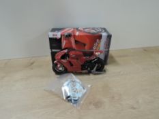 Tamiya 1:12 scale made up model kit, Ducati Desmosedici, some decals attached and some loose, with