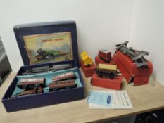 Hornby 0 Gauge, No 101 Tank Passenger Set. Tin plate and clockwork 0-4-0 LMS Loco and three