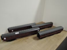 32mm gauge model kit built Passenger Coaches, all maroon, two with wheels loose but present (4)